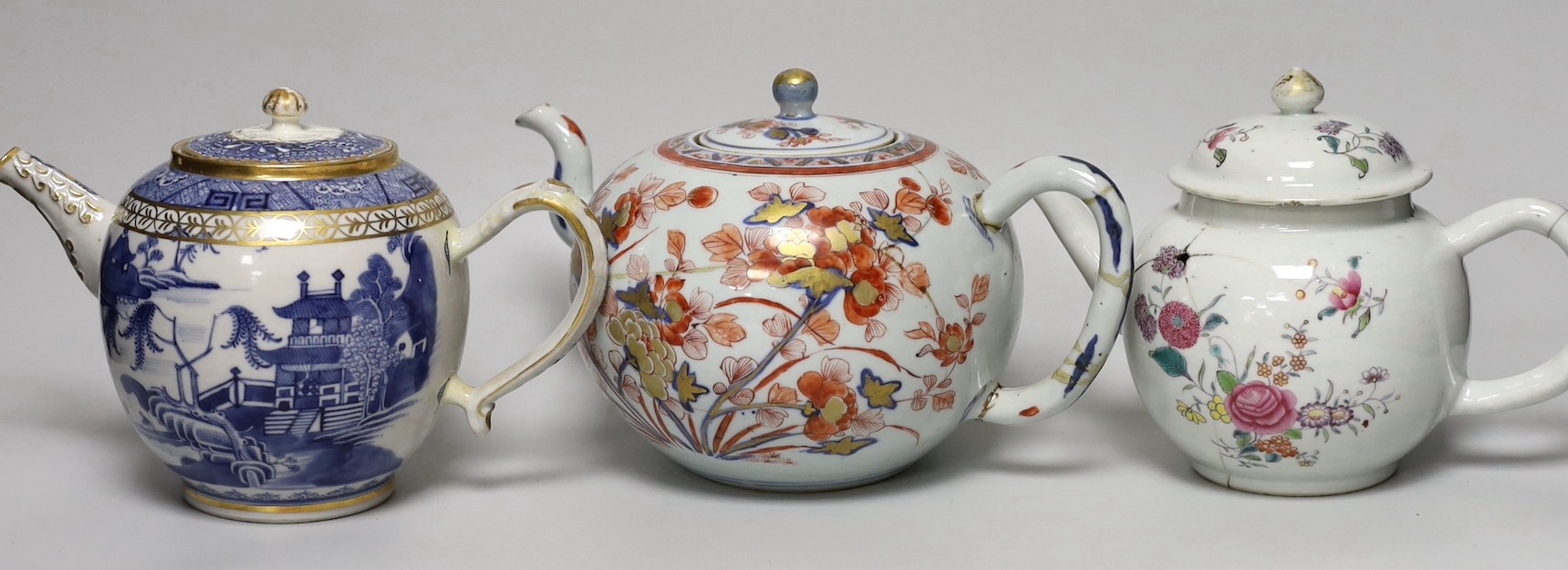 Four 18th century Chinese Export porcelain teapots. Tallest 15cm